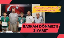 Madalya Alan Yıldız Pehlivanlardan Başkan Dönmez’e Ziyaret